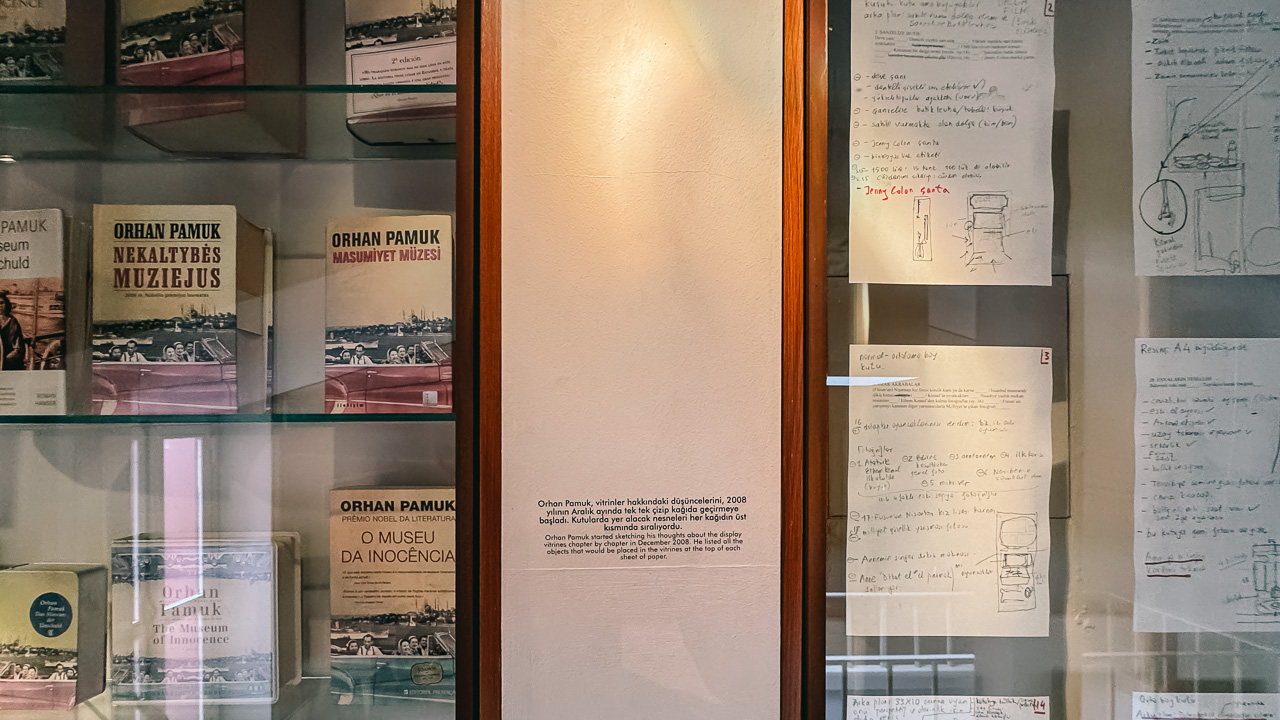 Foreign editions and handwritten manuscript from the novel The Museum of Innocence by Orhan Pamuk featured on the walls of the museum in Istanbul