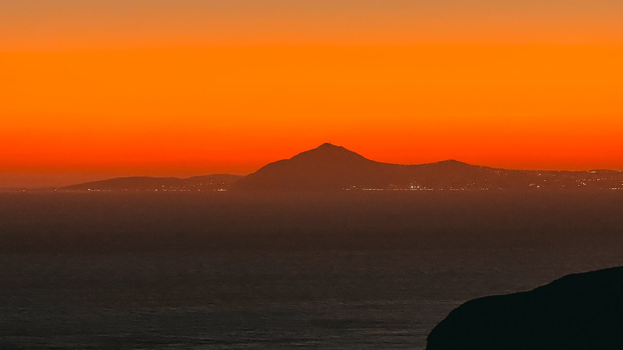 Sunset in Anafi overlooking Santorini - iPhone For Travel Photography