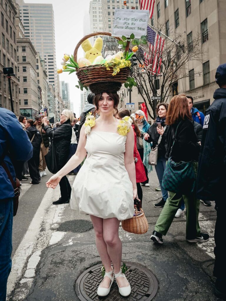 A woman with a basket in her head during the Easter Bonnet Festival