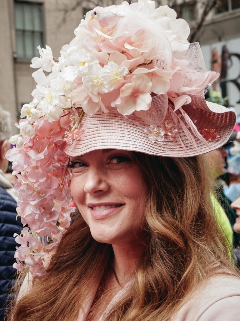 A woman with a floral hat in the 2026 New York Easter Parade