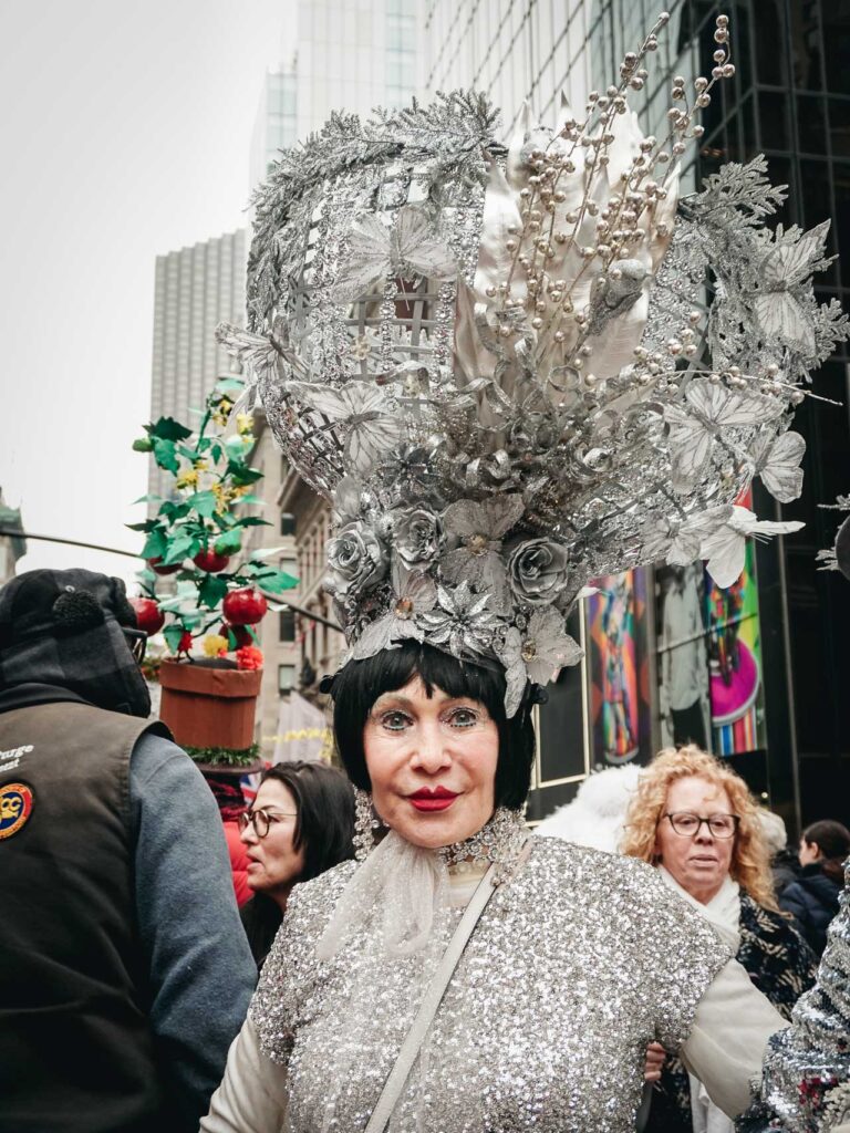 A woman with silver hat constructed for the Easter Bonnet Festival