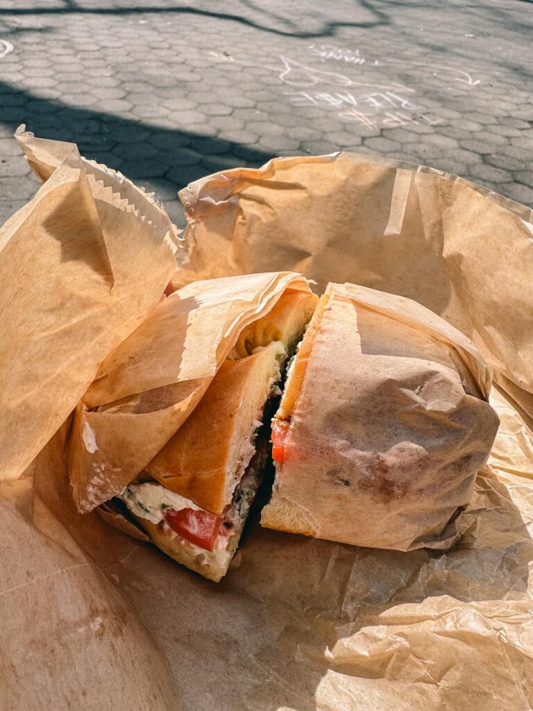 A bagel from Brooklyn Bagel and Coffee Company one the best places to eat a bagel in New York City