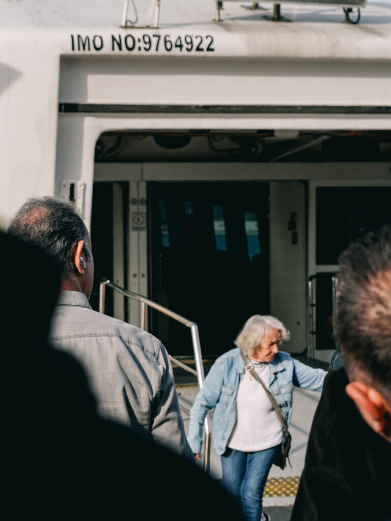 People waiting to embark on a ferry from Kadıköy to Karaköy in Istanbul