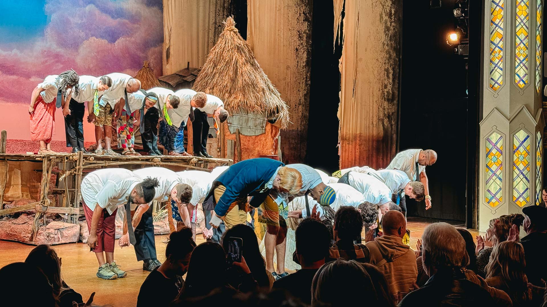 Actors bowing after the finale of The Book of Mormon in Broadway